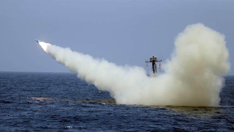 Iran fires missile at mock US aircraft carrier during exercise ...